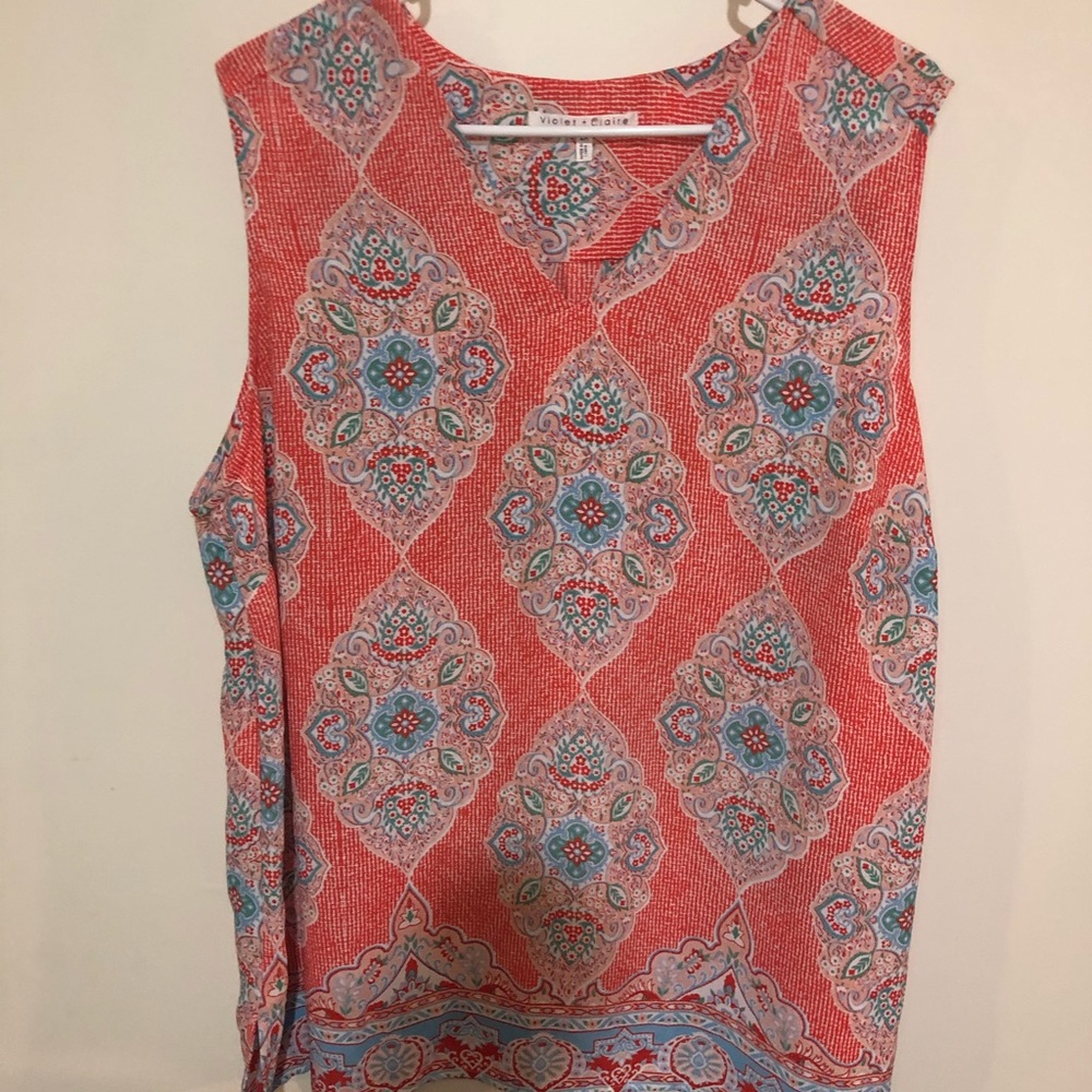 Orange patterned blouse